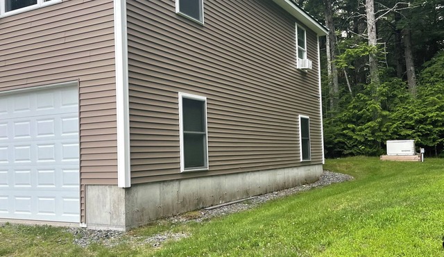 Desirable 3-bedroom apartment with AC and WiFi steps from Pristine Schoodic Lake