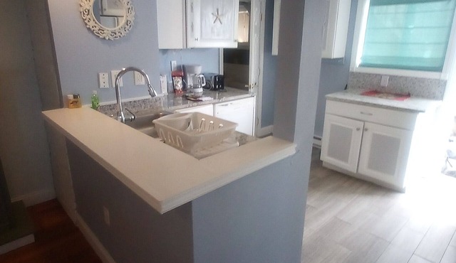 Direct ocean view 2 bed 2 bath 36 ft deck walk to beach.