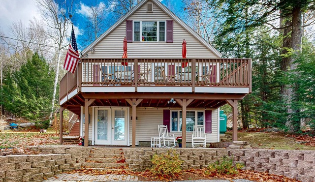 Dog-friendly retreat near the tranquil pond shore with spacious deck and dock