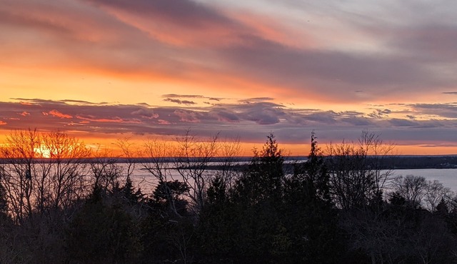 Enjoy elegant comfort with breathtaking water views on grand property
