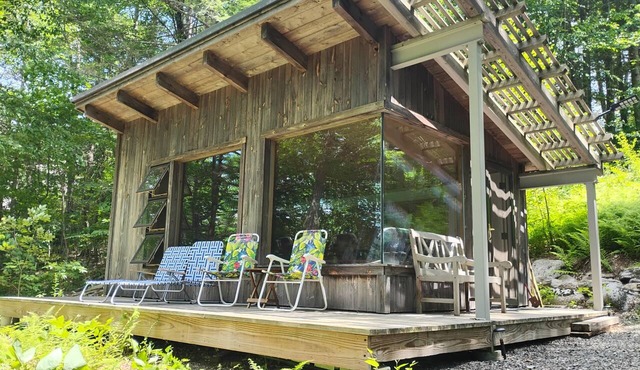 Enjoy fishing and kayaking from waterfront cabin retreat in charming Woodstock