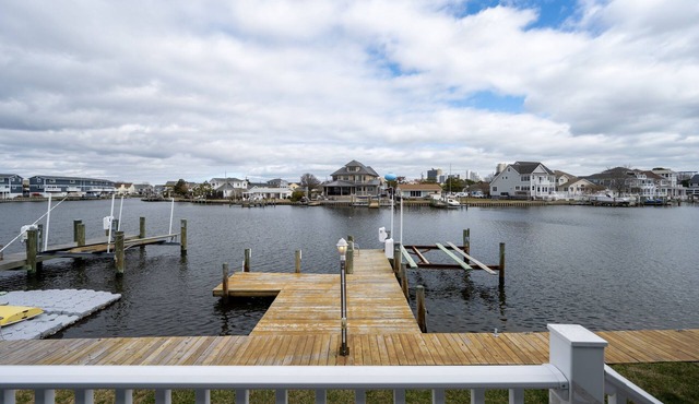 Enjoy the serene beauty of coastal living in his spacious 4-bedroom home