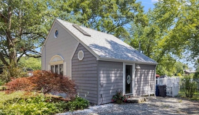 Freshly renovated waterfront retreat in Warwick Cove! This cozy 1-bedroom features a loft-style king bed, queen sleeper sofa, spacious deck, fenced yard, and open backyard leading to the water - perfect for a relaxing coastal escape.