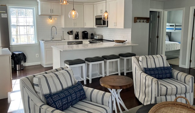 Fully renovated, dog-friendly home with private beach access & golf nearby
