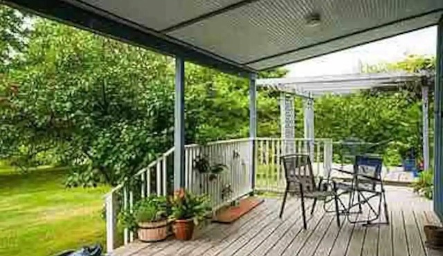 Hill top home located on 30 acres with privacy and surrounding natural beauty.