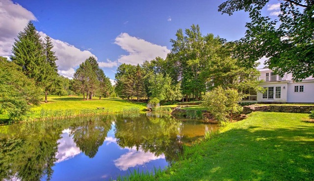 Historic waterfront farmhouse w/ private swimming pond, fireplace, & fast WiFi