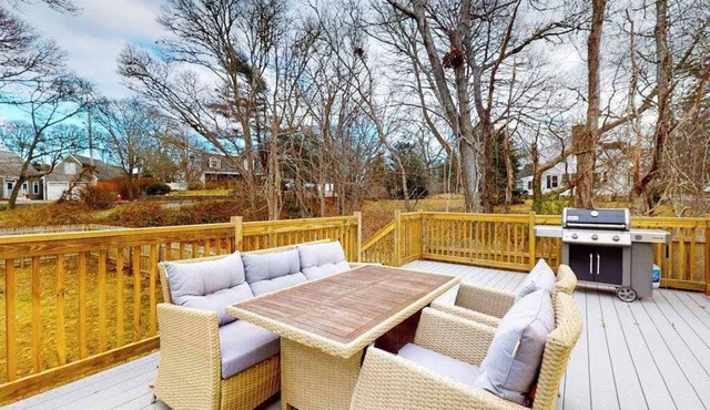 Inviting home + apartment near beach with furnished deck, yard, & grill
