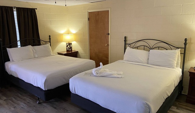 JI8, Queen Guest Room at the Joplin Inn at entrance to the resort, , just 2 1/2 miles from Lake Ouachita. by RedAwning