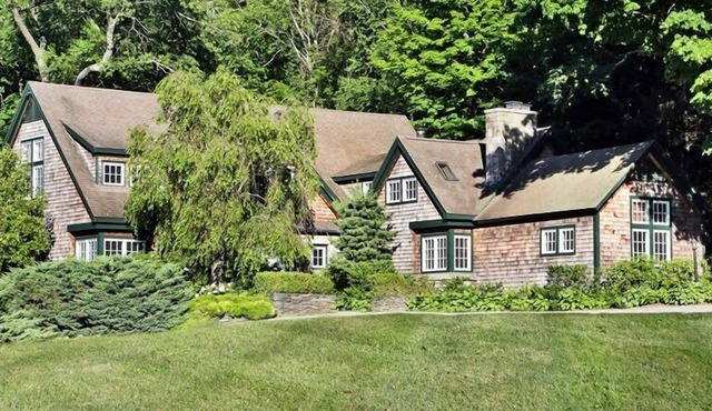 Lakefront home, water views, lovely patio, access to boat house and dock,...
