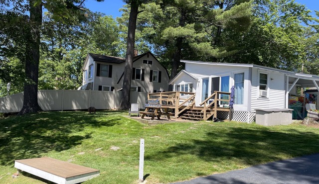 Lakefront Winnisquam Cottage with dock & boat ramp