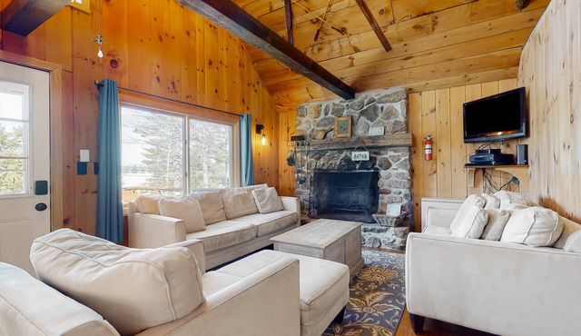Lakeside home with water views, firepit, deck, & W/D - dog-friendly