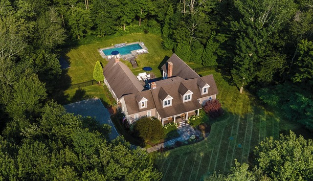 Luxurious 5-BR home in peaceful 3+-acre setting with heated, salt-water pool!