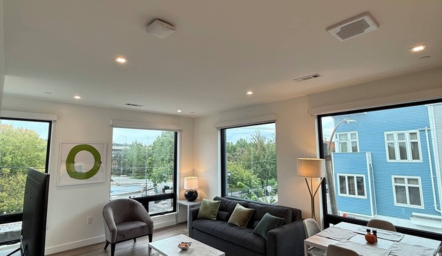 Luxury 1BR w/Rooftop 5 min to Logan Airport Free EV Garage Parking