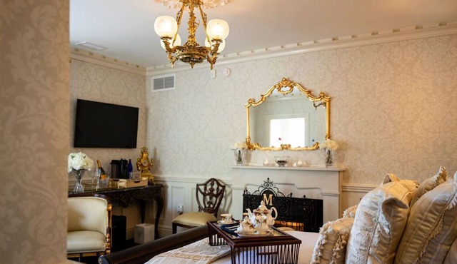 Luxury guest rooms in recently restored 1845 Gothic Revival Mansion.