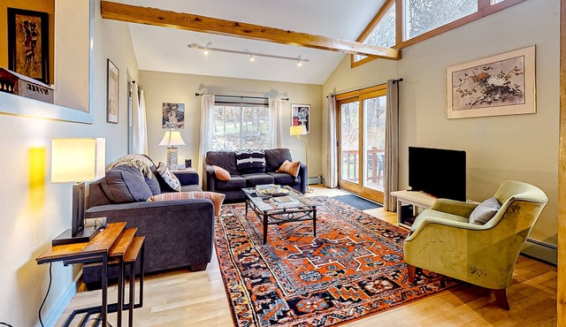 Magnificent mountain cottage with deck, firepit, W/D, wood stove, & water views