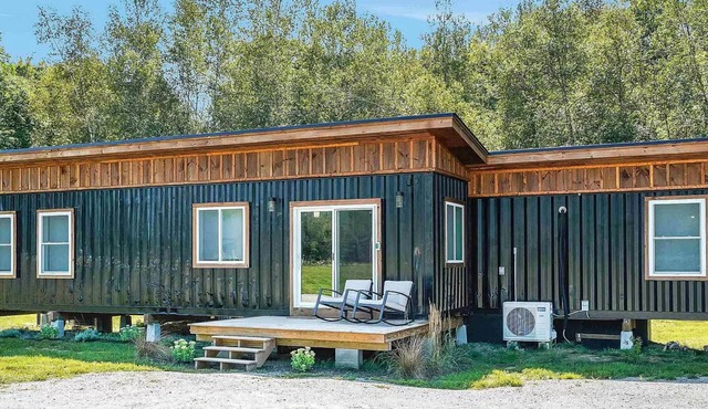 Modern Container House with mountains, river, and privacy.