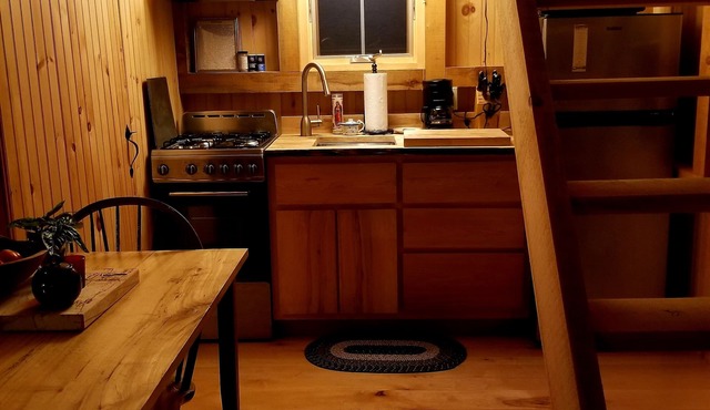 Northwoods Guest Cabin & porch overlooking private woods and stream