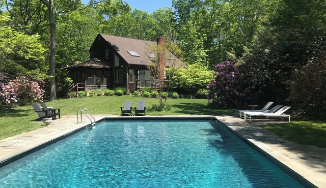 Perfect 3-bedroom house with pool on lush treed garden flag lot in East Hampton