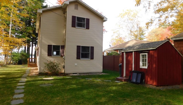 Pet-friendly home on Sebago Lake with sandy beach and spectacular views!
