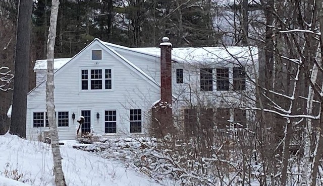 Picturesque creekside home with gorgeous deck & sunroom, near 4 ski mountains