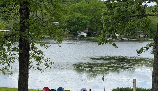 Relax at Grandma’s house with a screened in porch overlooking a private lake!