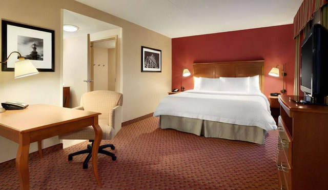 Rest Easy in Our Stylish King Suite! Free WiFi