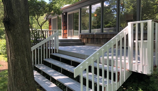Riverfront retreat in the woods of scenic Weston, Connecticut.