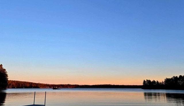 Scenic 2-bedroom Tiny Home on the Lake with dock, boat ramp & screenhouse
