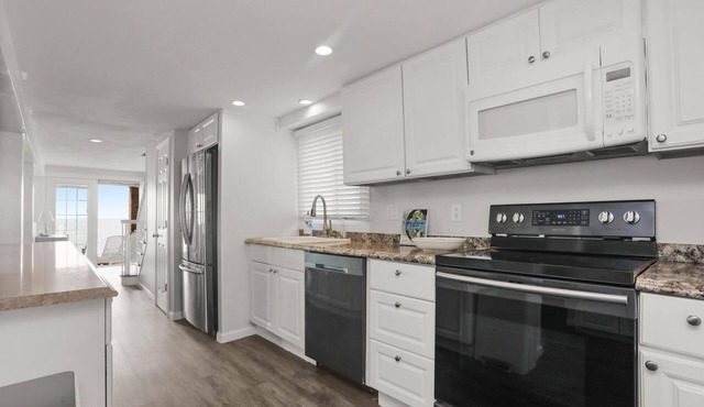 Spacious Beachfront home in vibrant Beach Community!