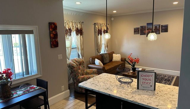 Spacious, Cozy, near T station -Private Parking -Free Wifi -Washer & Dryer - AC