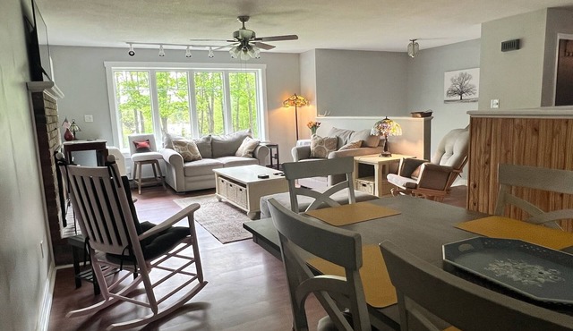 Spacious five-bedroom home off Back Lake with direct trail access on Spooner Rd