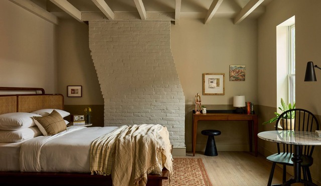 Spacious Studio Suite with Sitting Area & Local Artwork