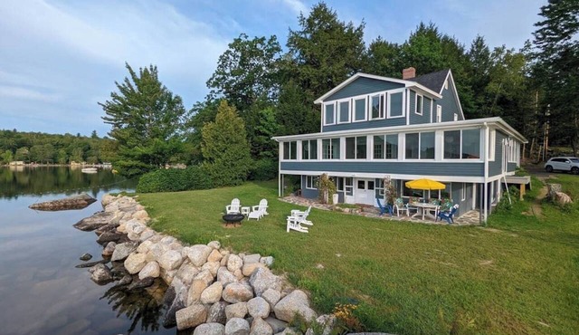 Stunning lakefront home with 270° water views and private beach near Acadia