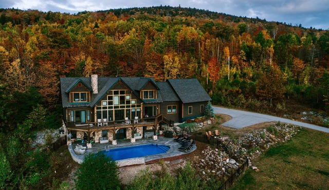 Stunning views, luxurious home, heated pool, hot tub, games