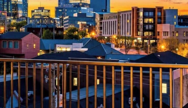 Summer rooftop deck, skyline views, garage-door kitchen near Broadway
