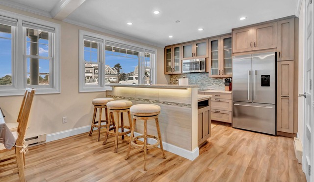 These luxury condos are located directly on the white sands of Pine Point Beach