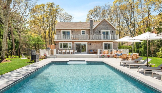 Timeless East Hampton retreat with amazing outdoor space, heated pool, wide.