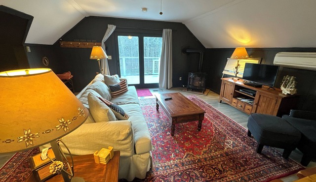 Trout River Suite - Amazing 1BR suite with deck overlooking the Trout River & only 7 minutes to Jay Peak Resort. With Breakfast Included!