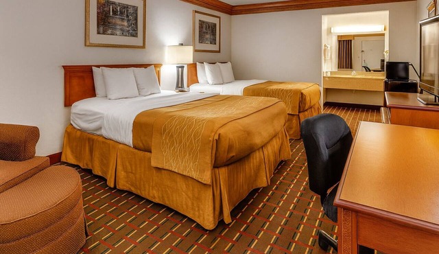 Two Convenient Room Located at I-28 | Outdoor Pool & Free Parking