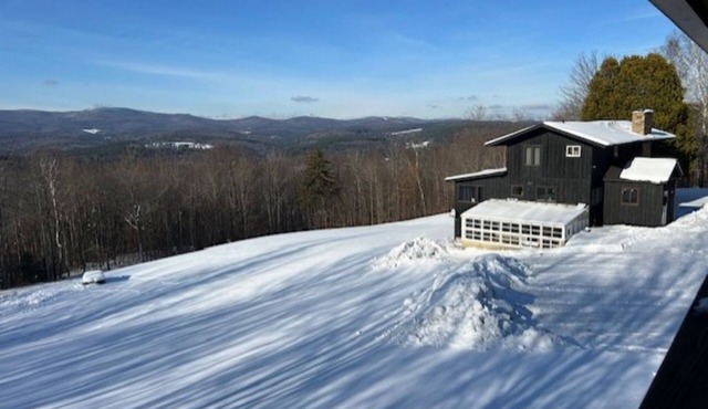 views of Sugarbush and Scragg Mtn. Three miles of hiking Heated 2 car garage,