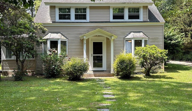 Warm Peconic home…short walk to a private beach.