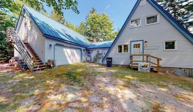 Waterfront A-frame on George's Pond with views, private dock, beach, kayaks, SUP