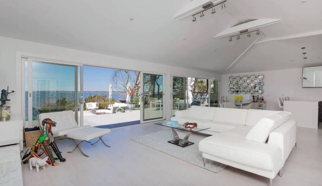 Waterfront home, infinity pool, private beach, and amazing sunsets!