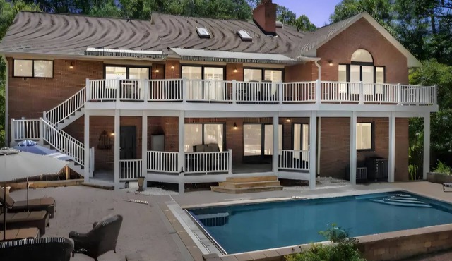 Waterfront home with pool and pier